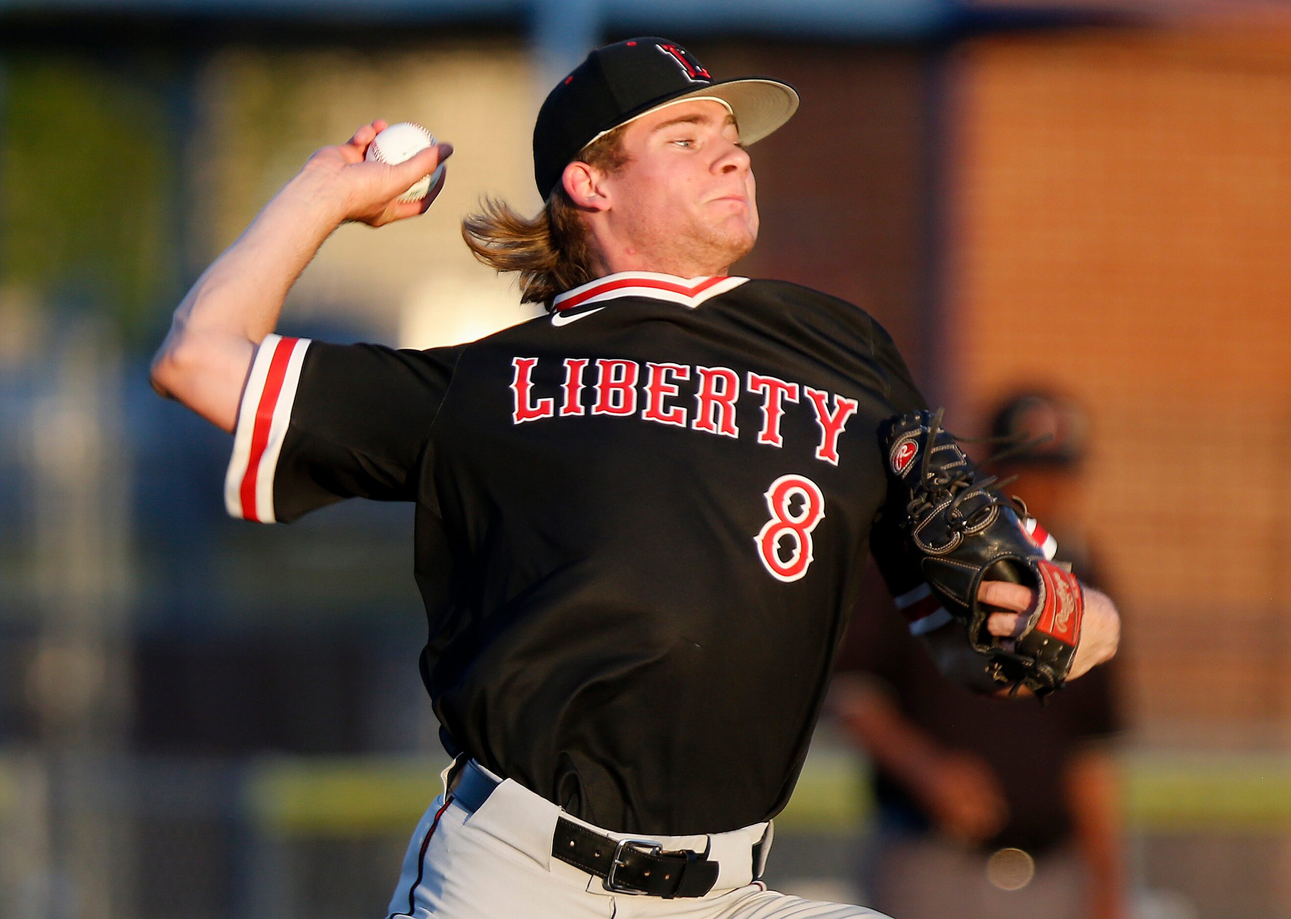 Liberty pitcher Oliver Overlin (8) delivers a pitch in the second inning as Frisco High...