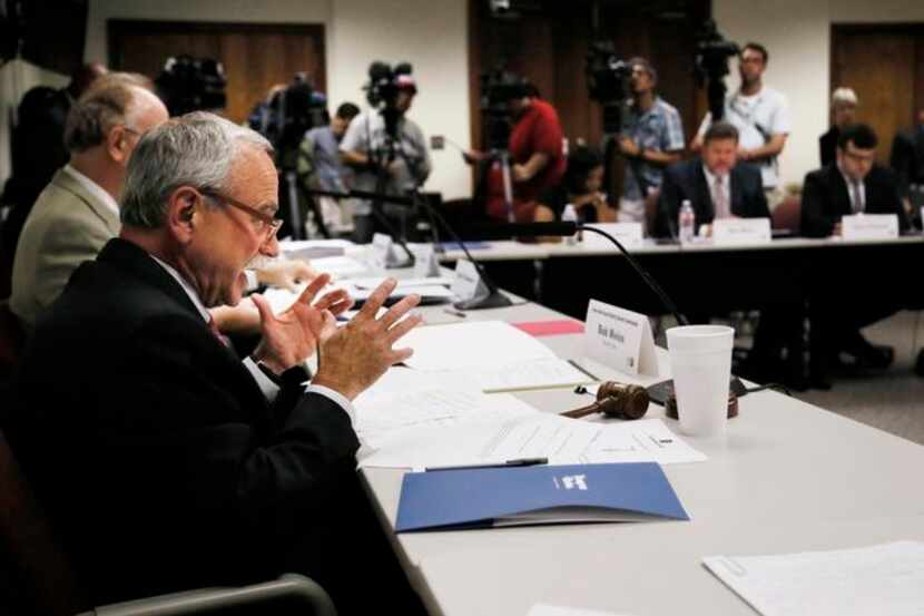 
Bob Weiss, chair of the Home-Rule School District Charter Commission, speaks during its...