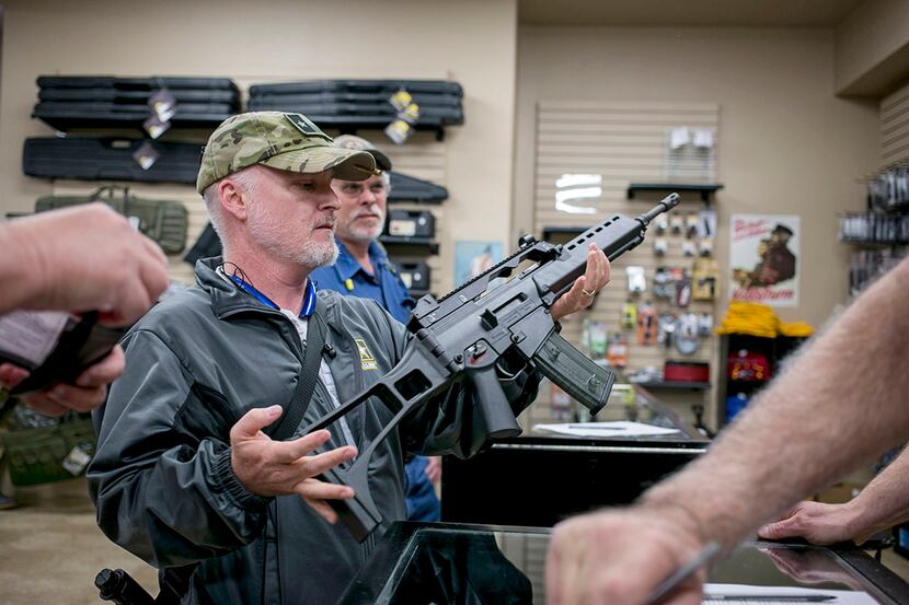  C.J. Grisham, president of Open Carry Texas, goes shooting at a gun range in Temple, Texas...
