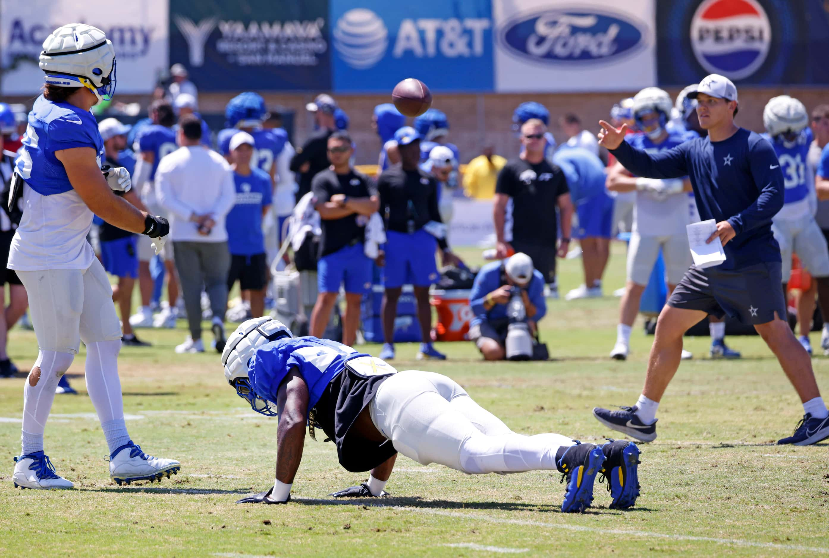 Los Angeles Rams linebacker Ernest Jones IV (53) does pushups after missing an interception...