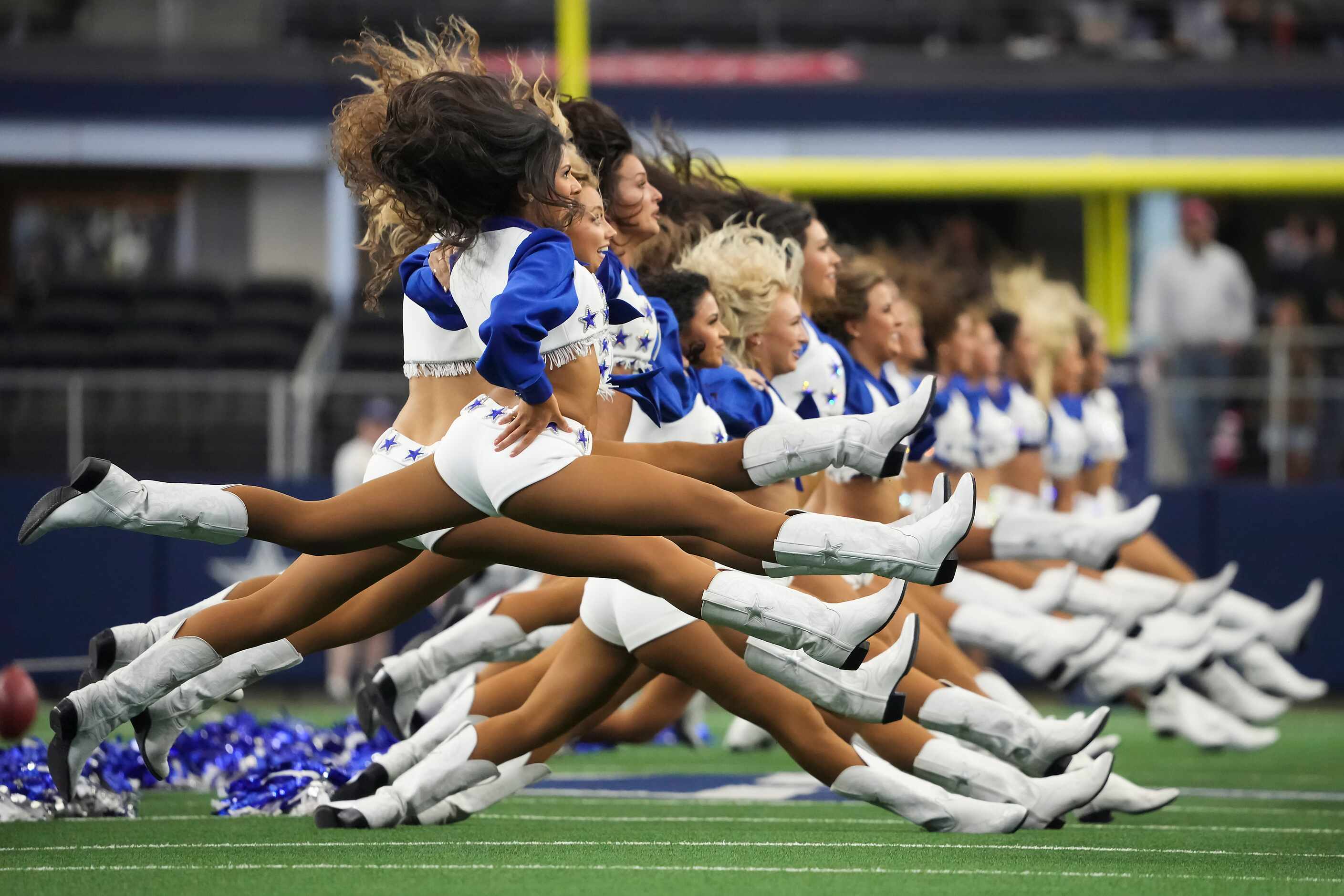 Dallas Cowboys cheerleaders perform before an NFL football game against the Atlanta Falcons...