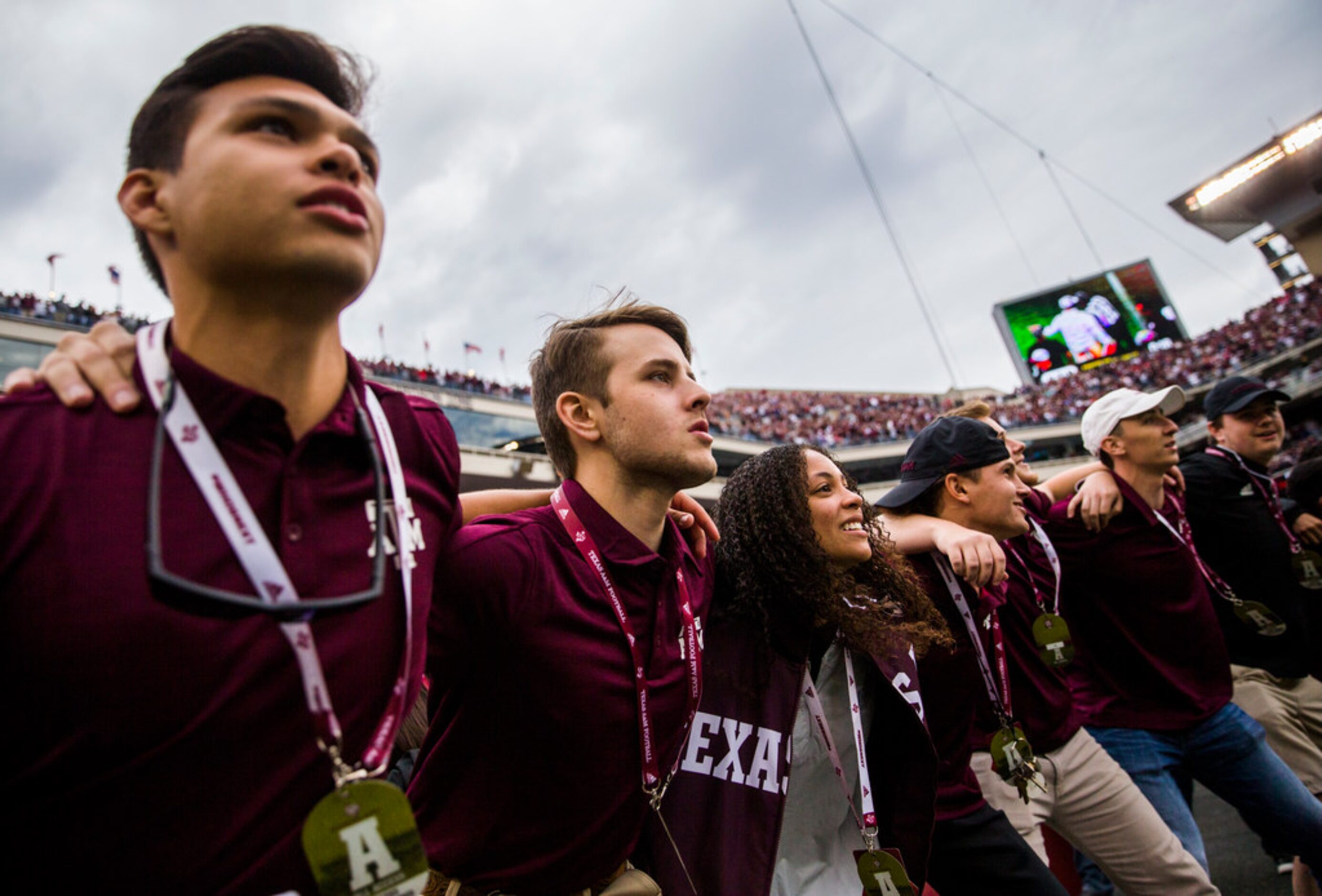 Texas A&M Aggies fans chant on the sideline before a college football game between Texas A&M...