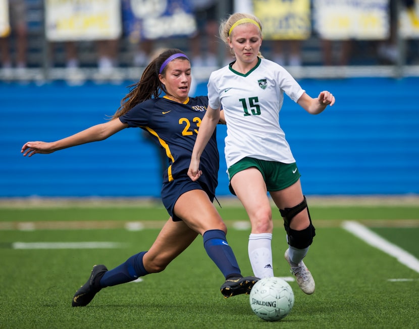 Highland Park forward Maja Davison (23) tries to get the ball from Humble Kingwood Park...