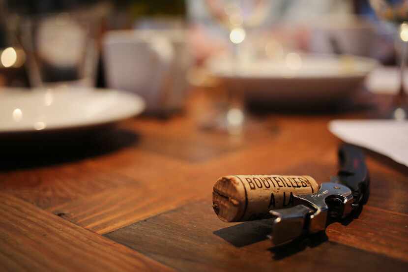 A used wine cork sits on the table during The Dallas Morning News wine panel in preparation...