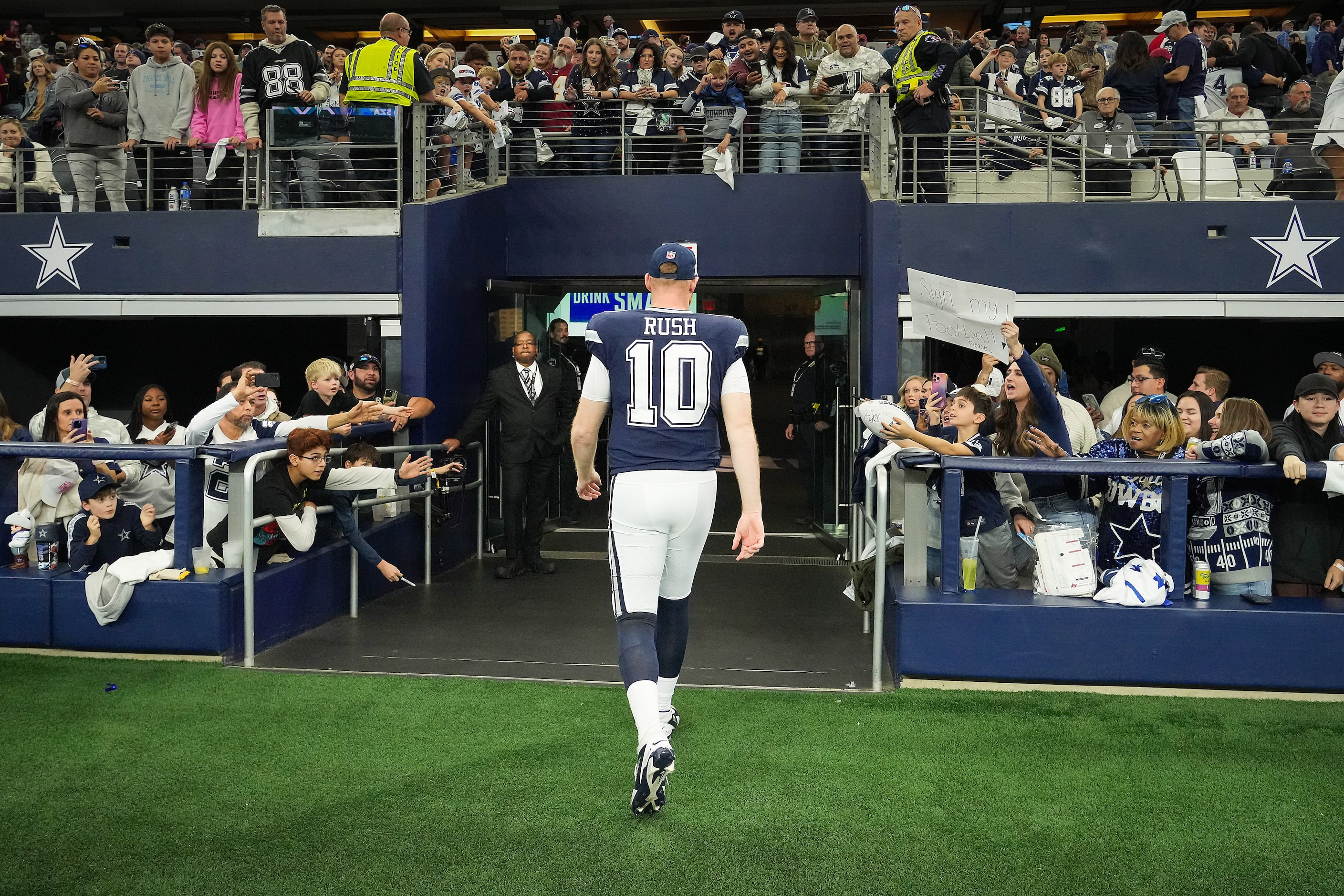 Dallas Cowboys quarterback Cooper Rush leaves the field after a loss to the Washington...