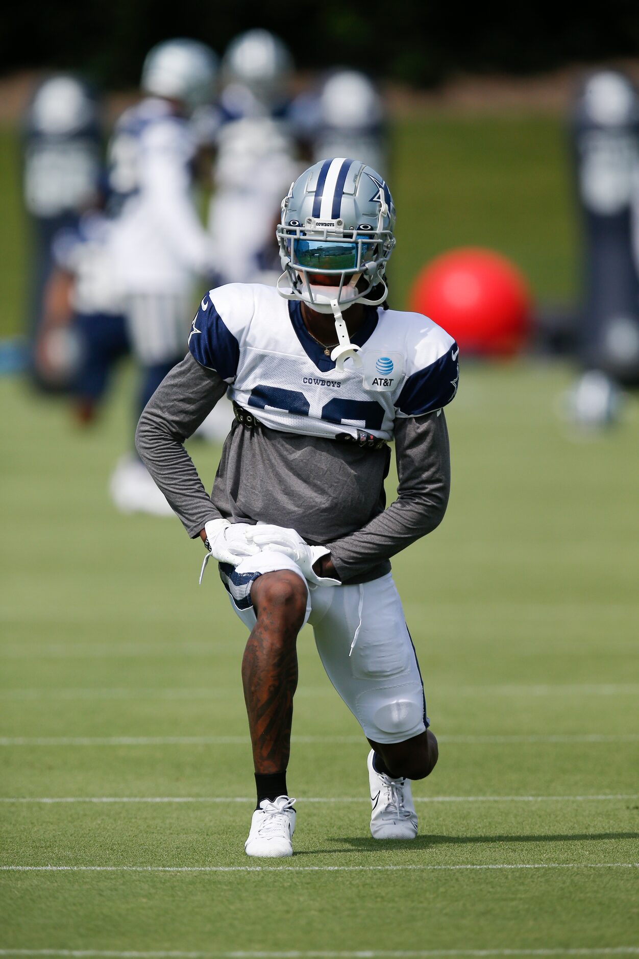 Dallas Cowboys wide receiver CeeDee Lamb (88) stretches during practice at The Star in...