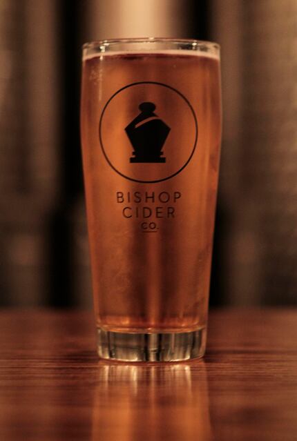 A glass of hard cider on the bar at The Bishop Cider Company in Dallas on Friday, Sept. 19,...