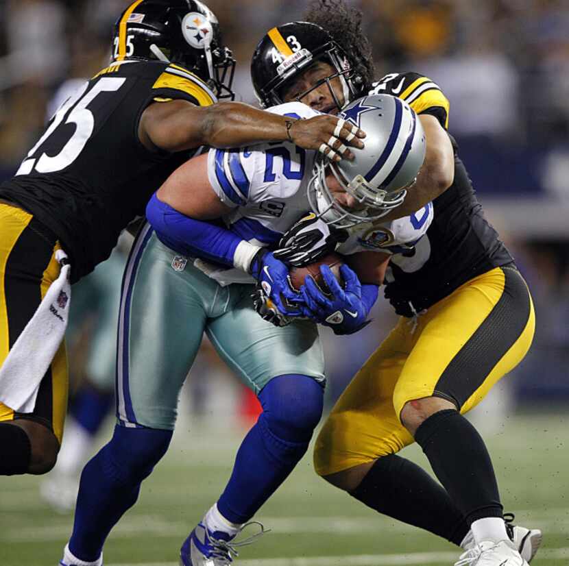 Pittsburgh Steelers free safety Ryan Clark (25) and strong safety Troy Polamalu (43) combine...