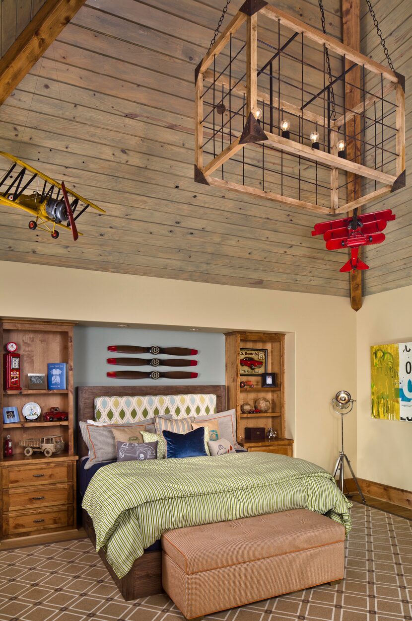 This child's bedroom has whimsical touches. There are nine bedroom suites in the home. Click...