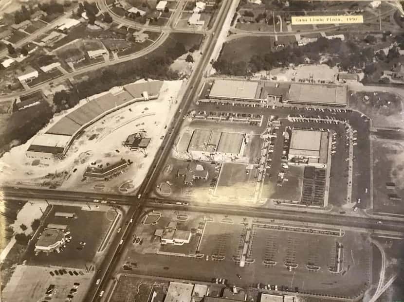 The aerial view of the plaza from 1950 shows the five trees along the promenade on the...