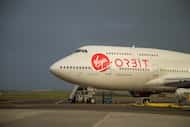 The 'Cosmic Girl' Boeing Co. 747 launch aircraft, operated by Virgin Orbit Holdings Inc., on...