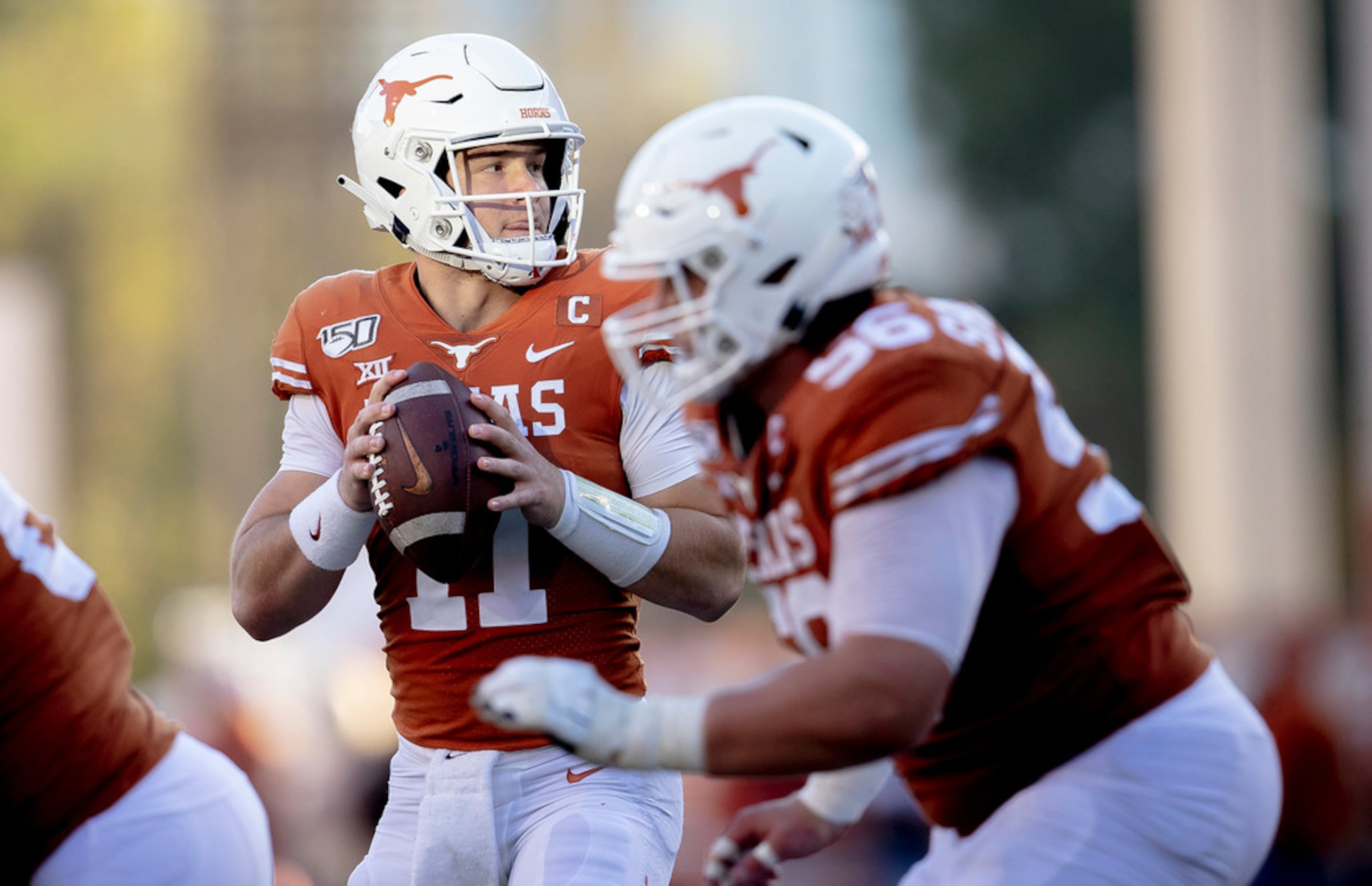 Texas quarterback Sam Ehlinger (11) looks for an open receiver against Kansas State during...