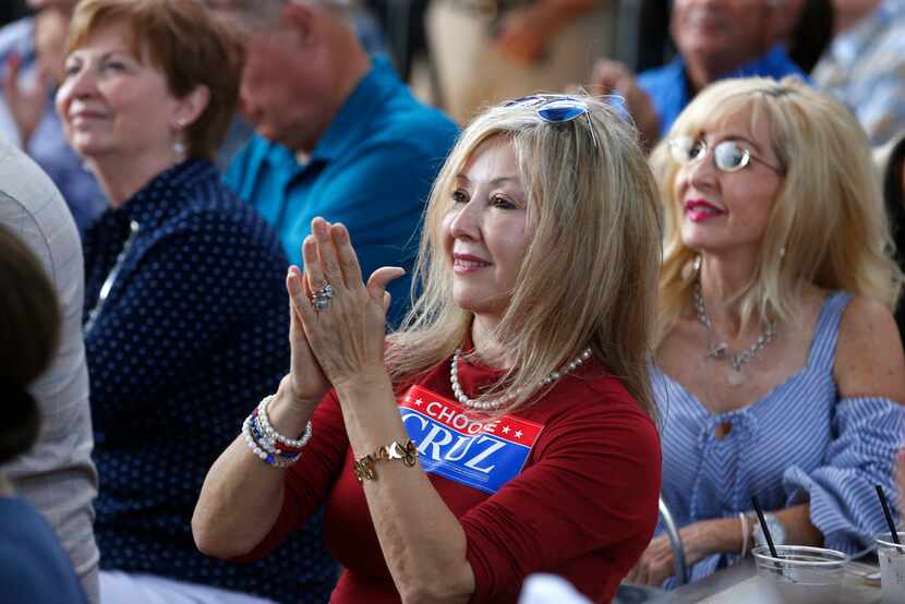 Gina O'Briant, president of the Texas Women for Trump Coalition, clapped during Republican...