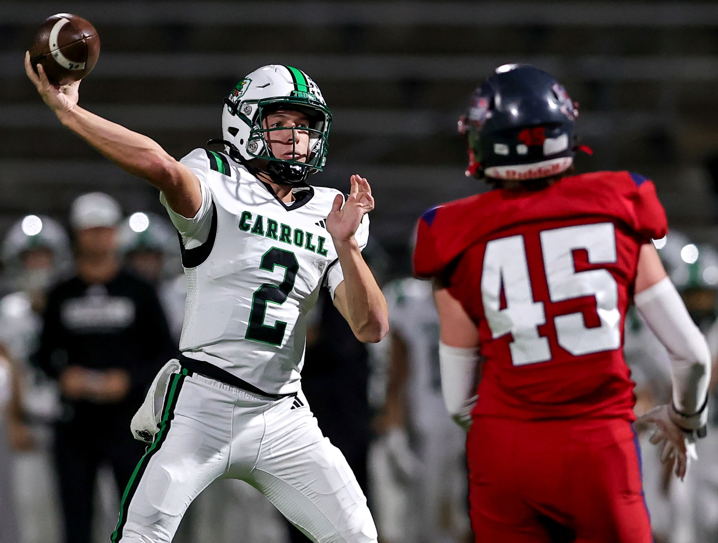 Southlake Carroll quarterback Angelo Renda (2) gets off a pass in front of Justin Northwest...