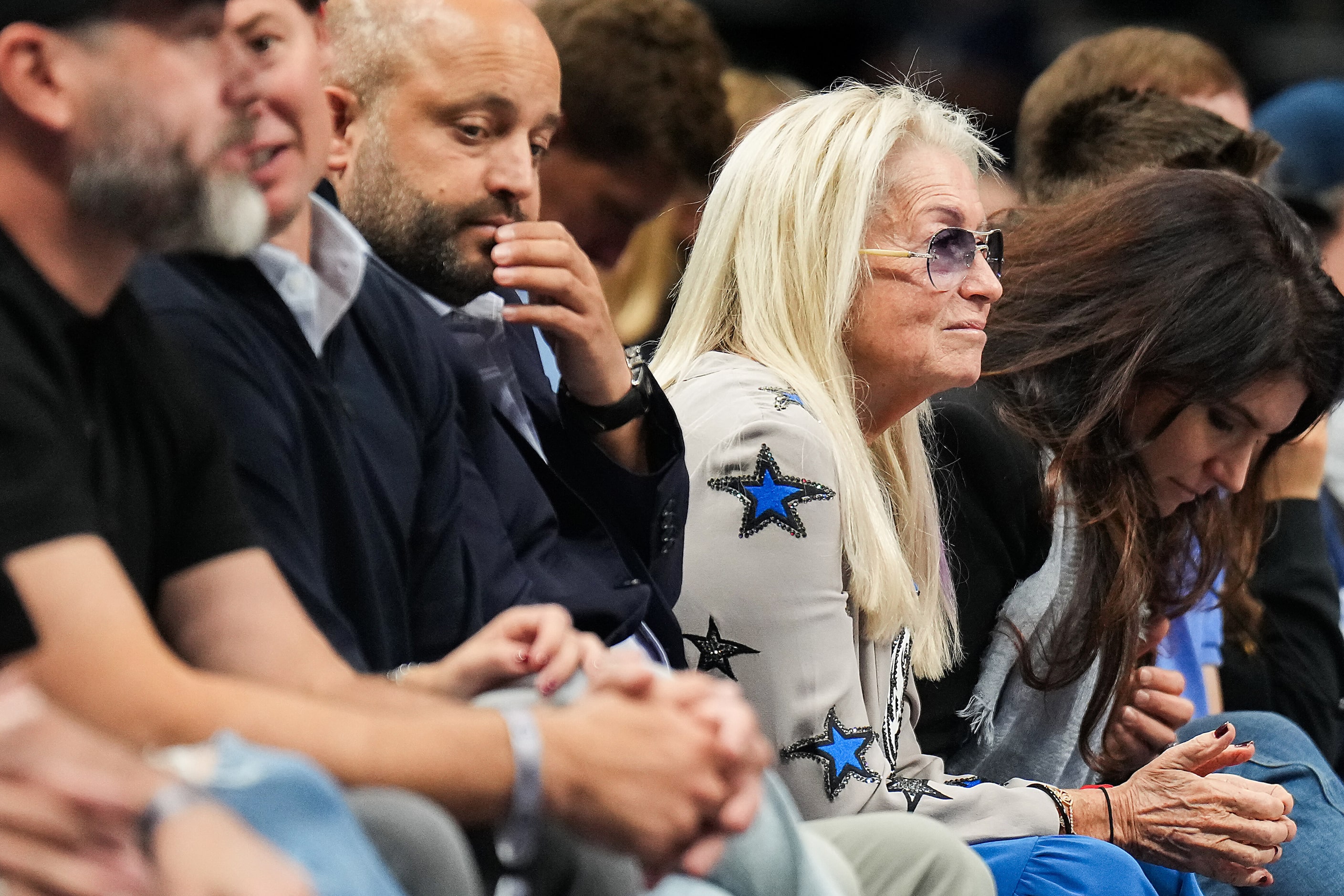 Miriam Adelson watches during the first half of an NBA basketball game between the Dallas...