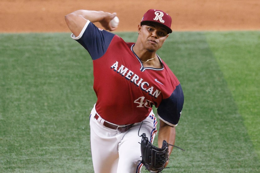 American League's pitcher Winston Santos (40)(TEX) delivers during the seventh inning of the...