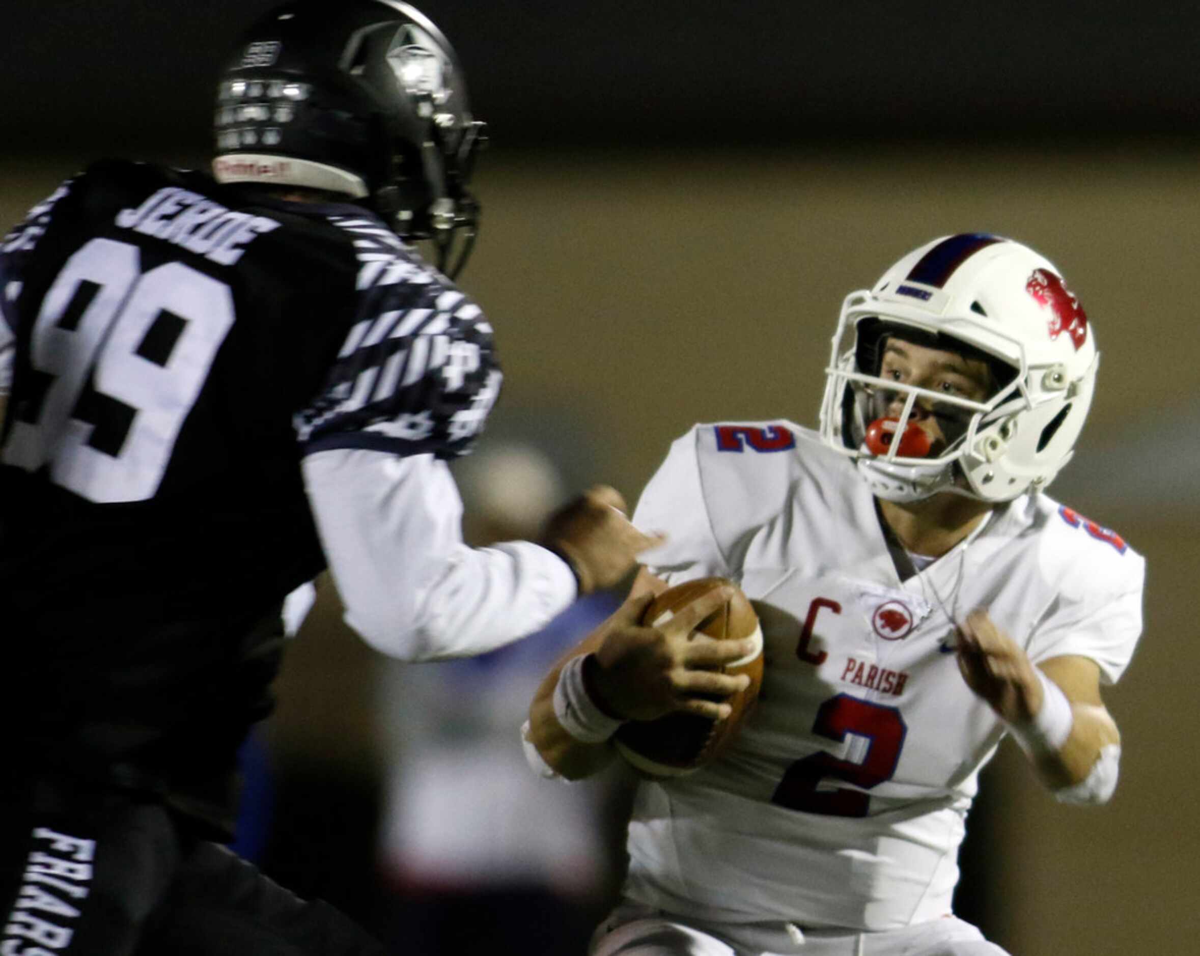 Parish Episcopal quarterback Preston Stone (2) pumps the brakes to avoid the pursuit of...