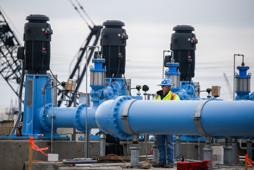 Construction crews work on upgrades at the North Texas Municipal Water District complex in...