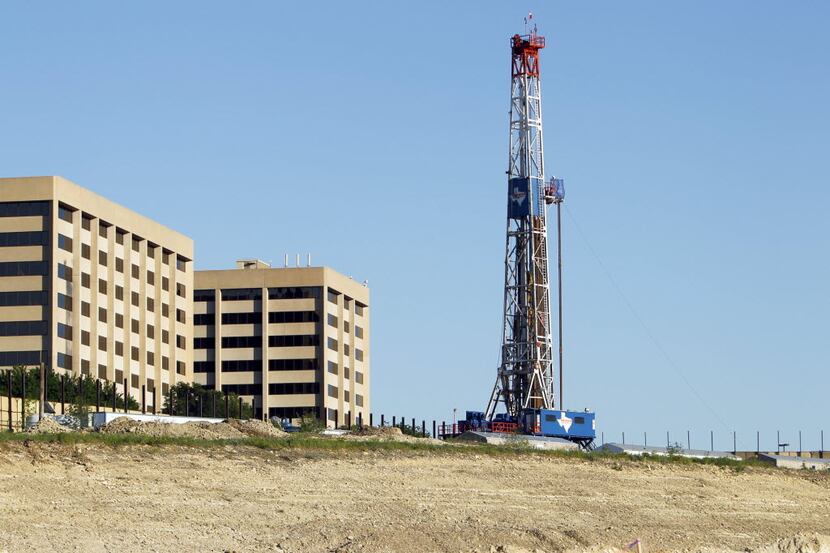 A Union Drilling Inc. gas drilling rig was near Bryant Irvin Road and State Highway 183 in...