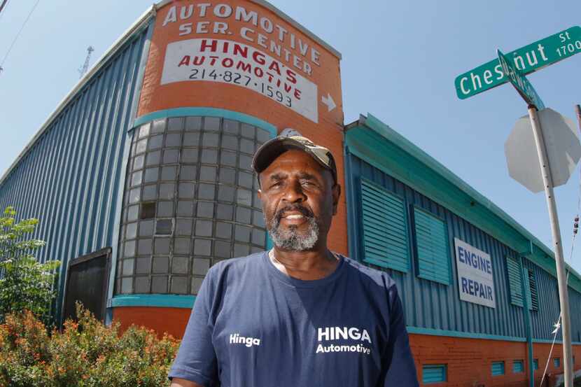 Auto shop owner Hinga Mbogo, in front of his new location on Chestnut Street in Dallas,...
