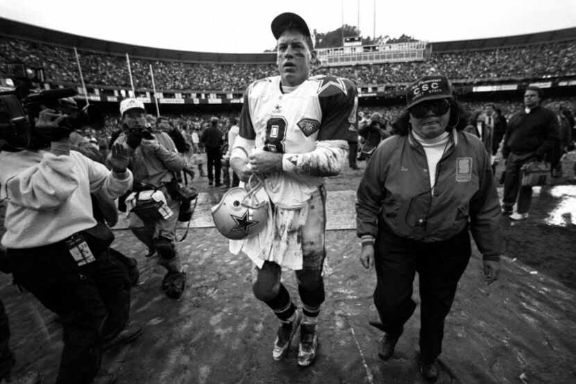 Dallas Cowboys QB Troy Aikman (8)  leaves the field after the Cowboys loss to the San...