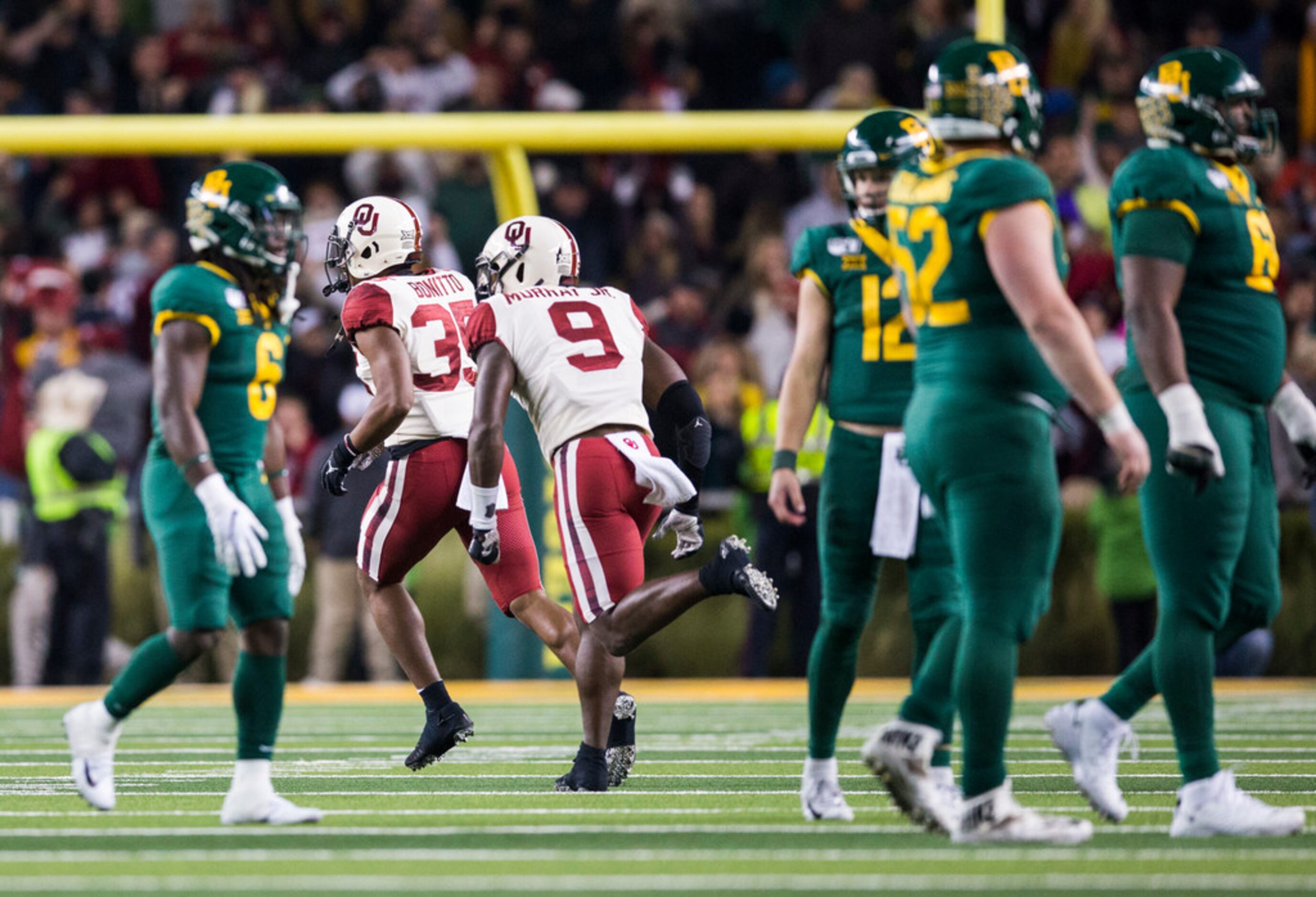 Oklahoma Sooners linebacker Nik Bonitto (35) and linebacker Kenneth Murray (9) celebrate...