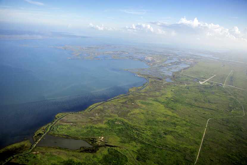 Aerial overview of the Matagorda Island Wildlife Management Area with the Gulf of Mexico (at...