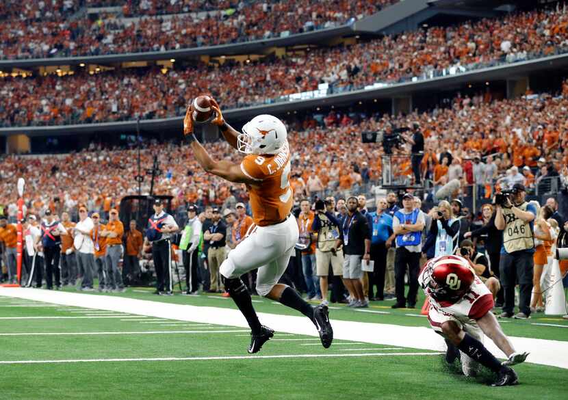 Texas Longhorns wide receiver Collin Johnson (9) is wide open in the end zone but drops the...