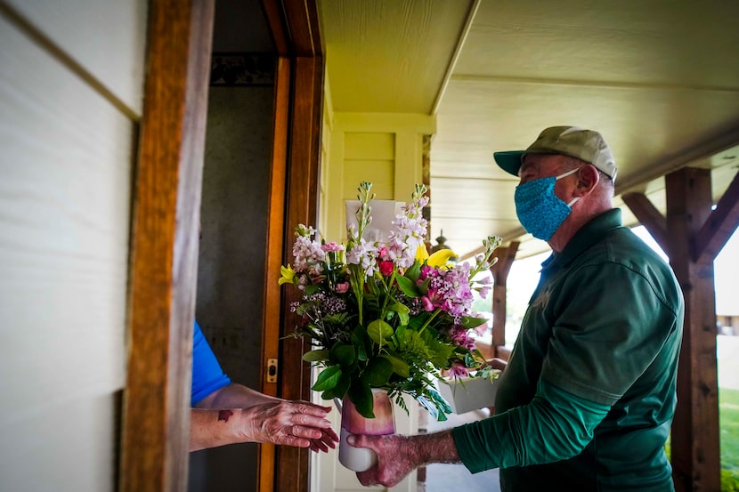 Emmett Conoly of McShan Florist made a flower delivery for Mother's Day in Heath on May 9,...