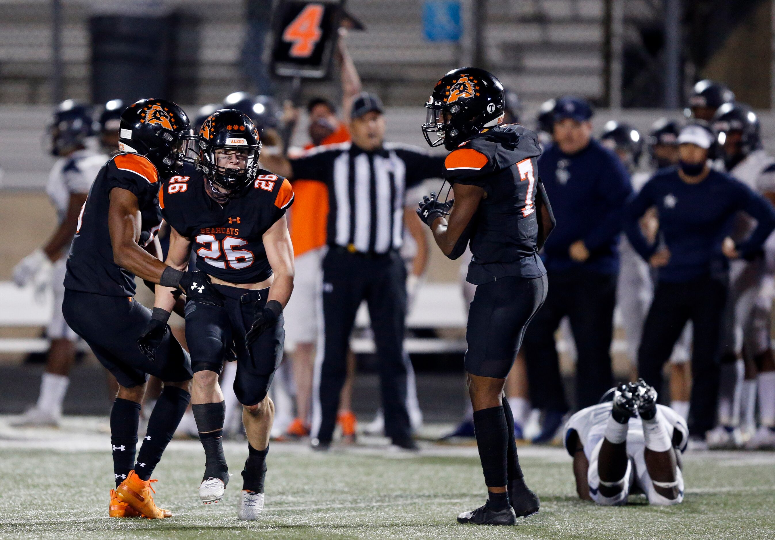 In the fourth quarter, Aledo's Sammy Steffe (26) celebrates a fourth down stop of Frisco...