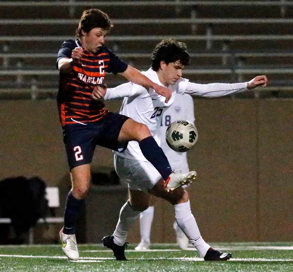 Wakeland midfielder Nick Hollomon (2) battles for the ball with Wylie East’s Robin Linhart...