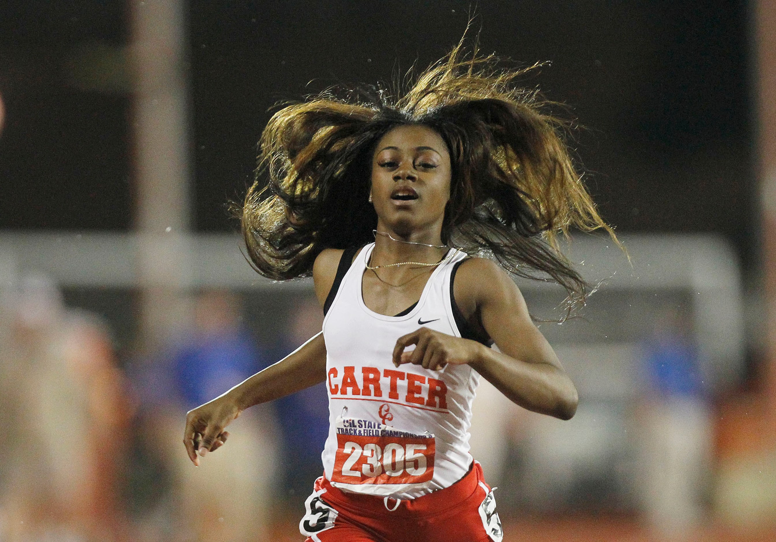 Dallas Carter's Sha'Carri Richardson competes in the class 4A girls 200-meter dash during...