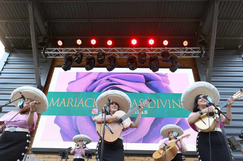 Mariachi Rosas Divinas performs at the Box Garden at Legacy Hall in Plano for Cinco de Mayo...