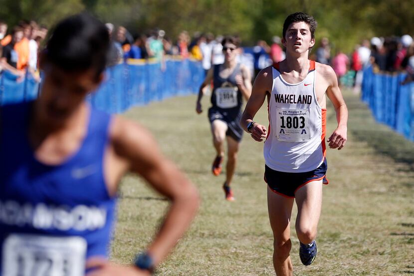 Wakeland's Nick Hendrix (1803) approaches the finish line as he competes in the 5K of the...