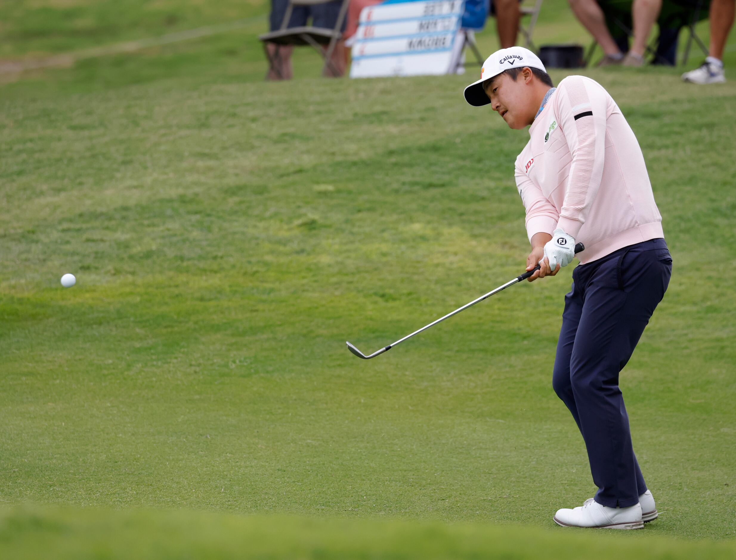 Kyoung-Hoon Lee hits on the green on the 18th hole during round 2 of the AT&T Byron Nelson ...