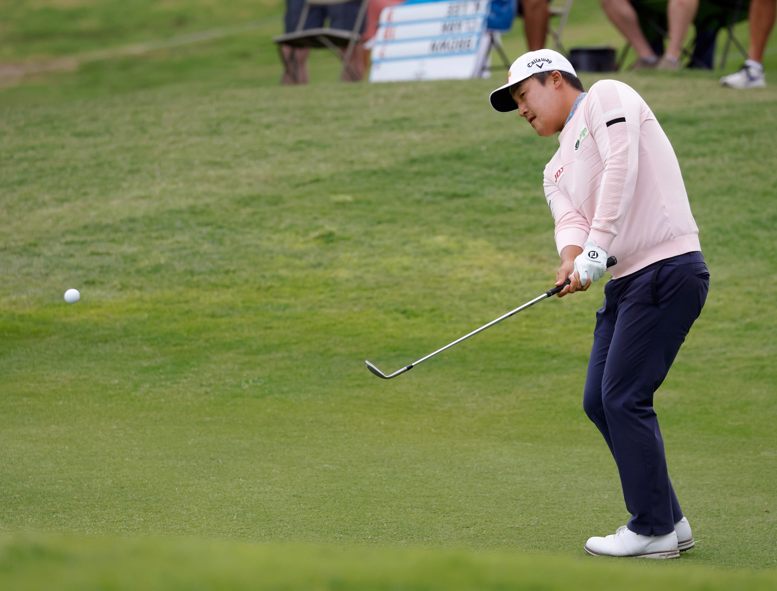 Kyoung-Hoon Lee hits on the green on the 18th hole during round 2 of the AT&T Byron Nelson ...