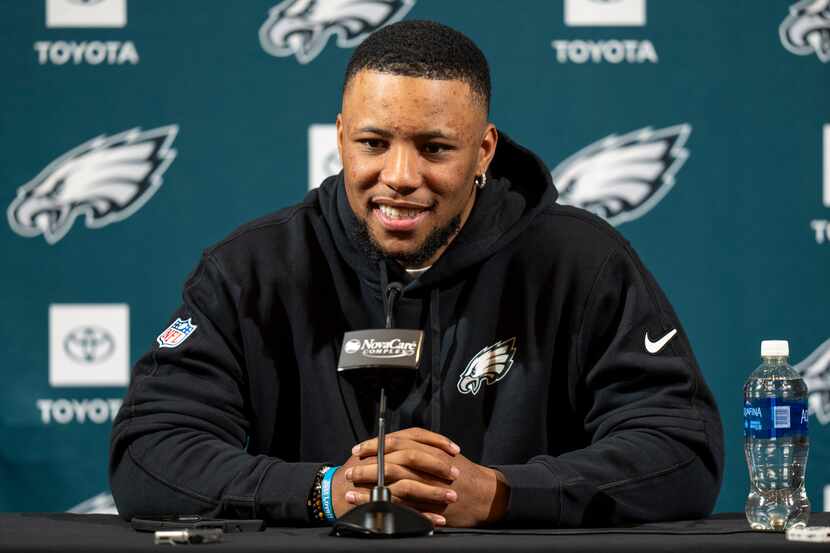 Philadelphia Eagle's Saquon Barkley talks to the media during a press conference after...