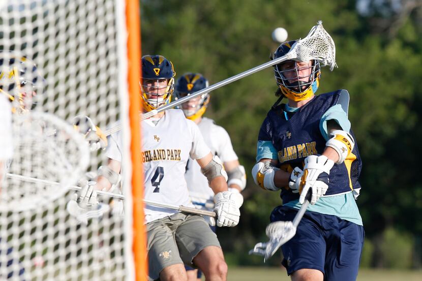 Highland Park lacrosse players are pictured during a practice at MoneyGram Park in Dallas on...