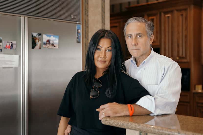 Sylvia Wang and her husband, Shawn Cumberland, at their home in Houston on Oct. 19, 2019....