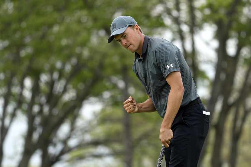 FARMINGDALE, NEW YORK - MAY 19: Jordan Spieth of the United States reacts to his putt on the...