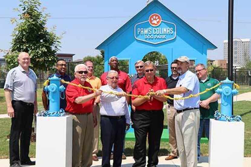 Irving Mayor Rick Stopfer cut the ribbon at the opening of Paws Colinas Dog Park recently...