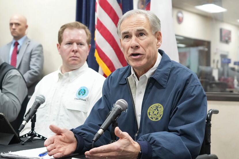 Texas Gov. Greg Abbott, shown in Austin on Dec. 21, said that during coordination calls with...
