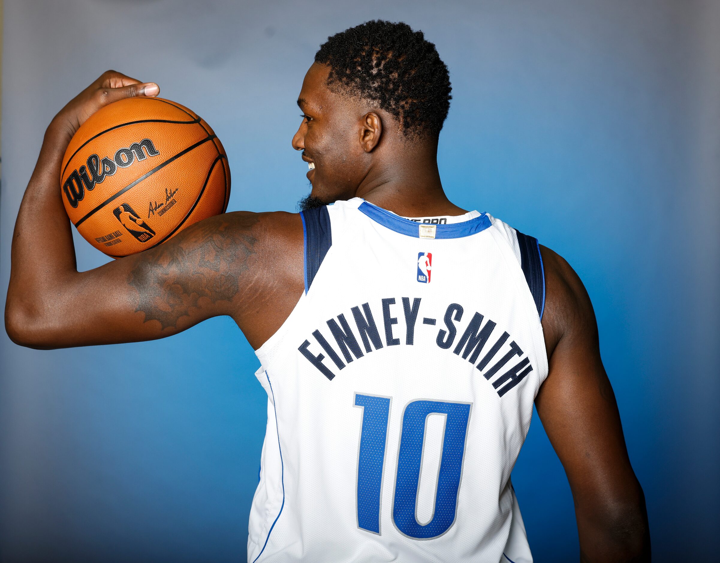 Dallas Mavericks’ Dorian Finney-Smith is photographed during the media day at American...