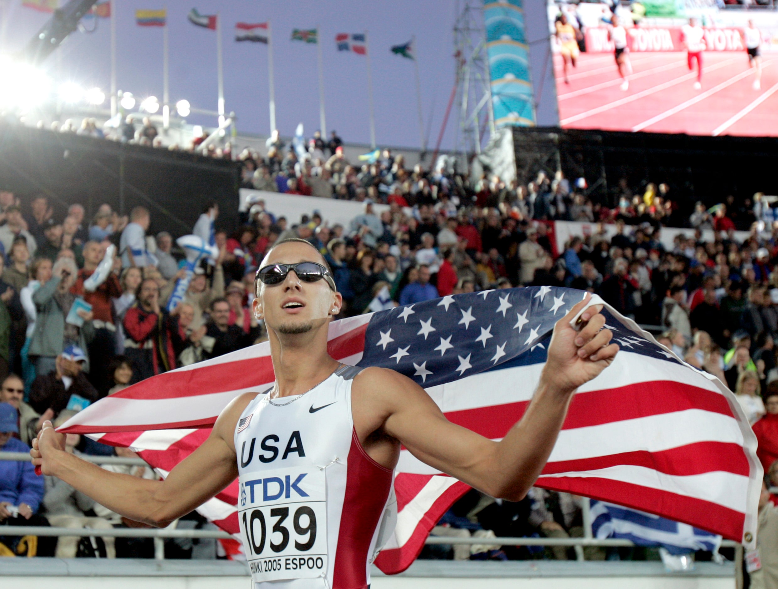 From 2005: Jeremy Wariner of the US poses with the Stars and Stripes after winning the gold...