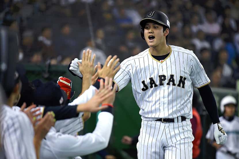 TOKYO, JAPAN - NOVEMBER 12:  Shohei Ohtani #16 of Japan celebrates after hitting a solo...
