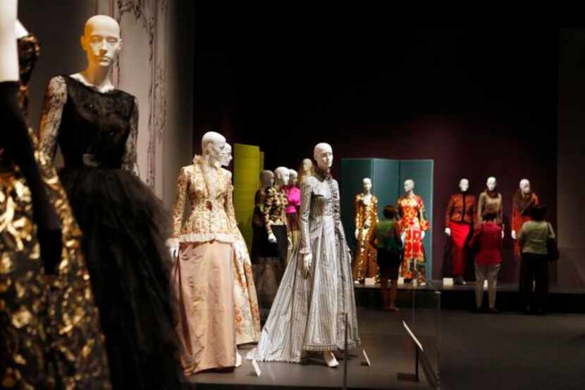 
A variety of evening dresses on display at the Oscar de la Renta: Five Decades of Style...