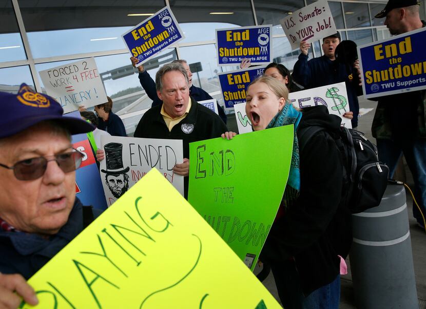 EPA worker and AFGE Local 1003 member Sarah Frey leads union and federal airport employees...