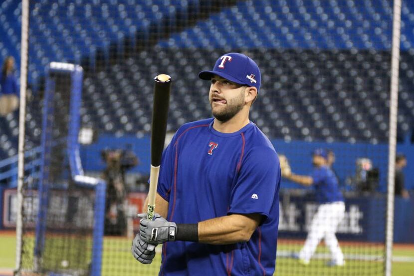 Texas Rangers first baseman Mitch Moreland (18) gets ready to take some swings in the cage...