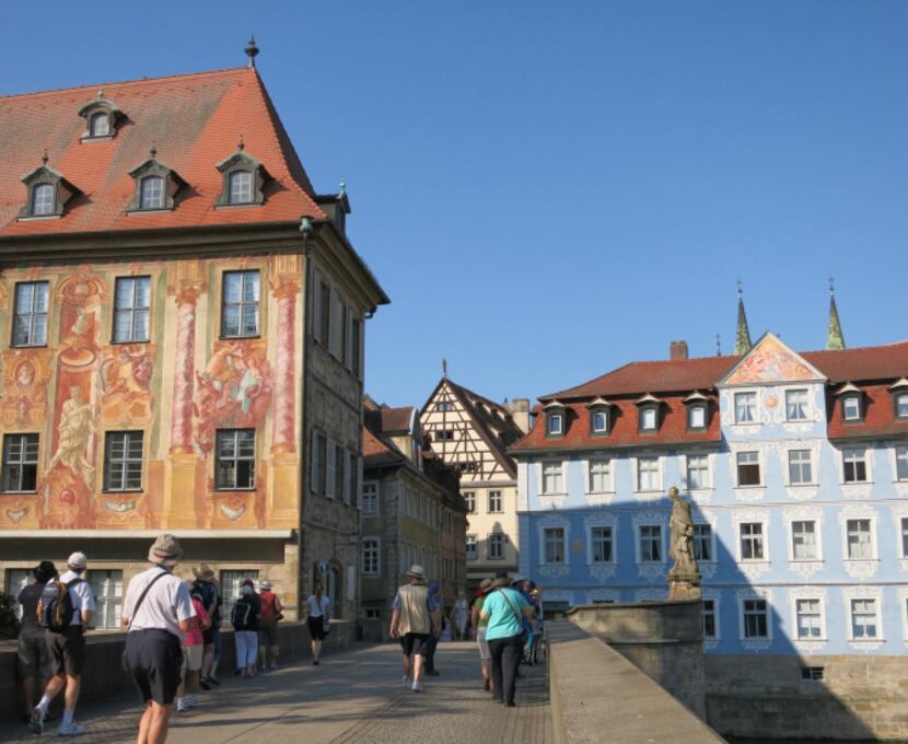 Cruise passengers stroll part of Bamberg's Old Town section. The entire district is declared...