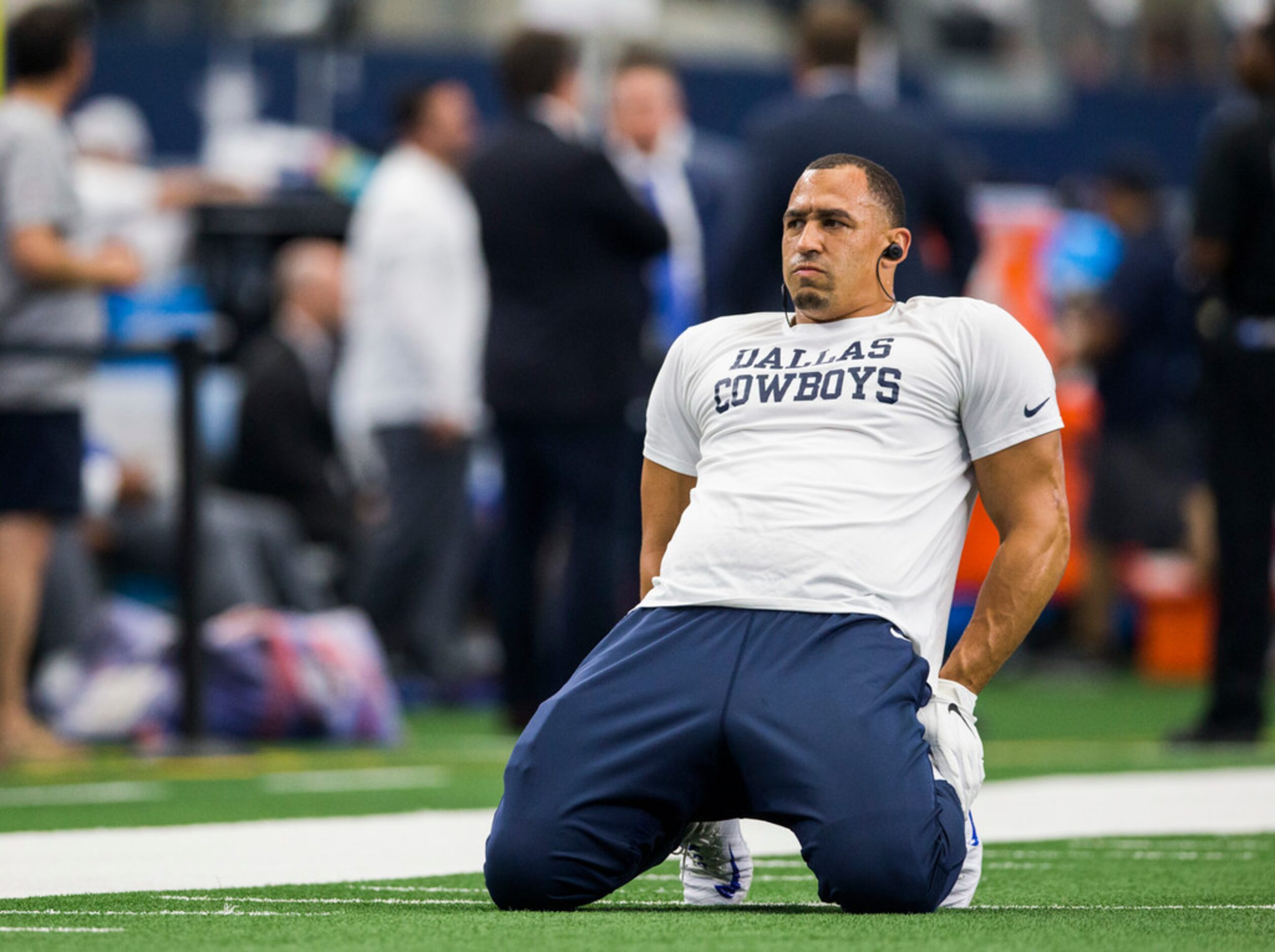 Dallas Cowboys defensive tackle Tyrone Crawford (98) warms up before an NFL game between the...